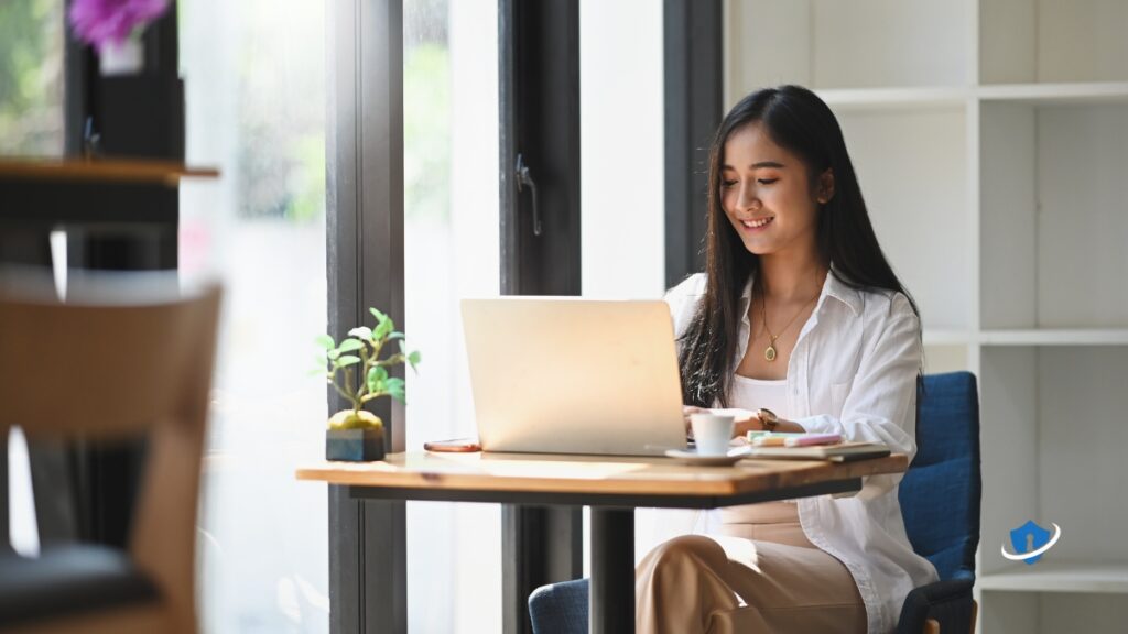 A person using a laptop confidently after clearing their data.