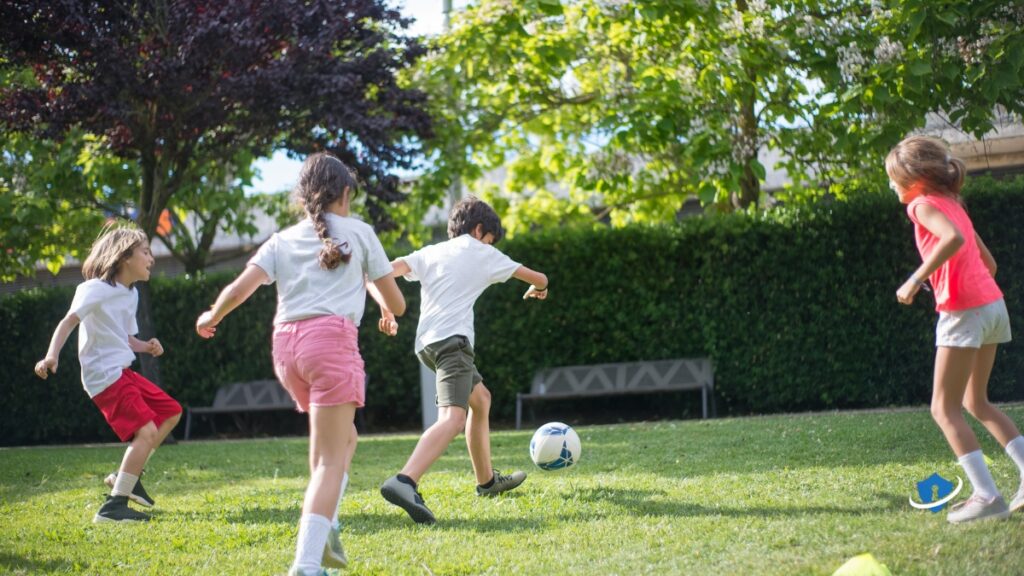 Kids playing football.